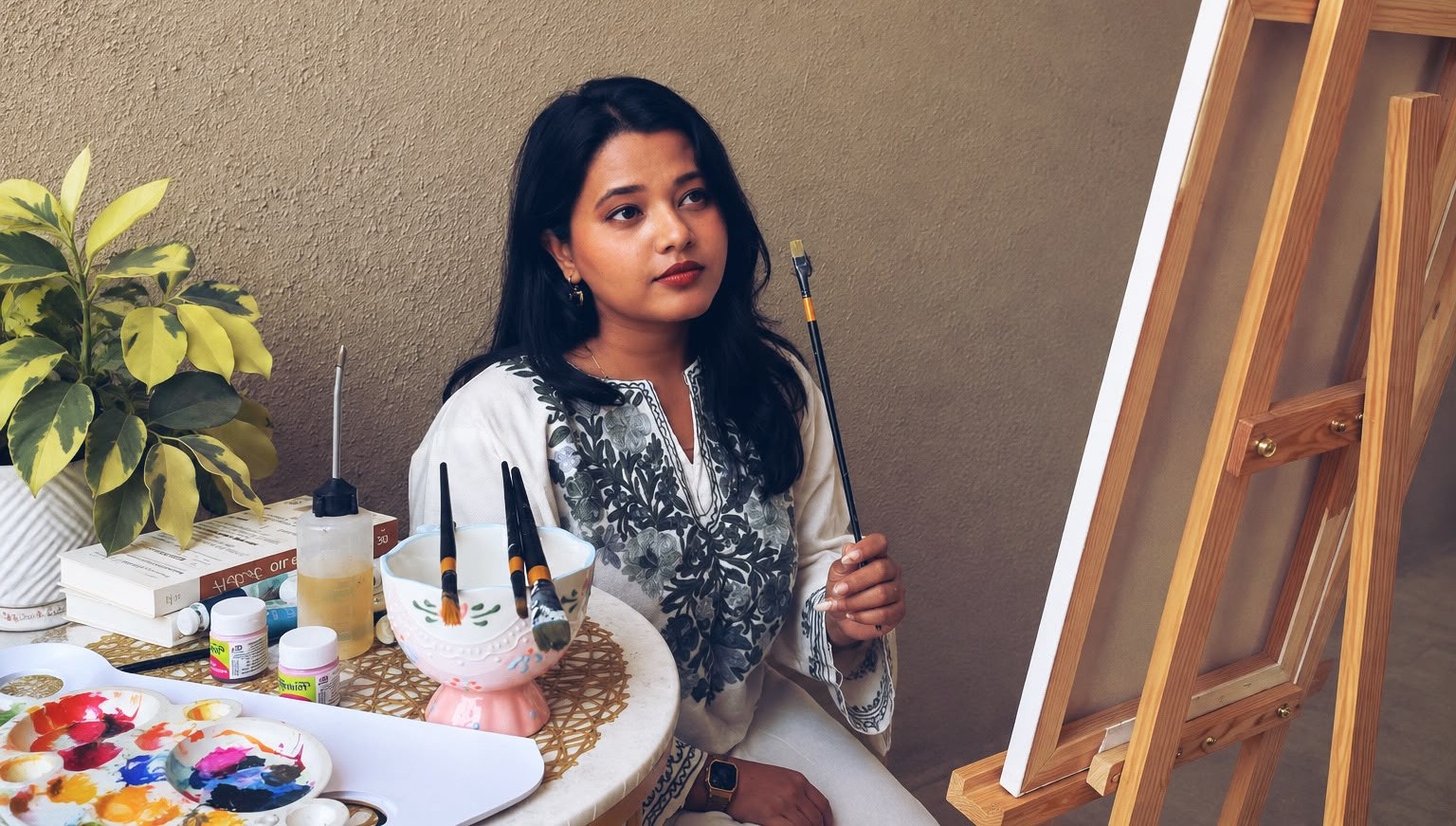 Ruchita Mudgal painting in her studio